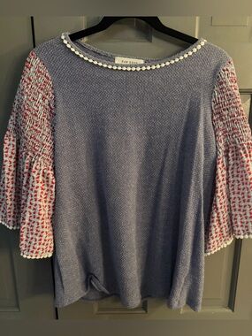 Raw Edge Heather Blue Knit Top with Red Printed Bell Sleeves One Size